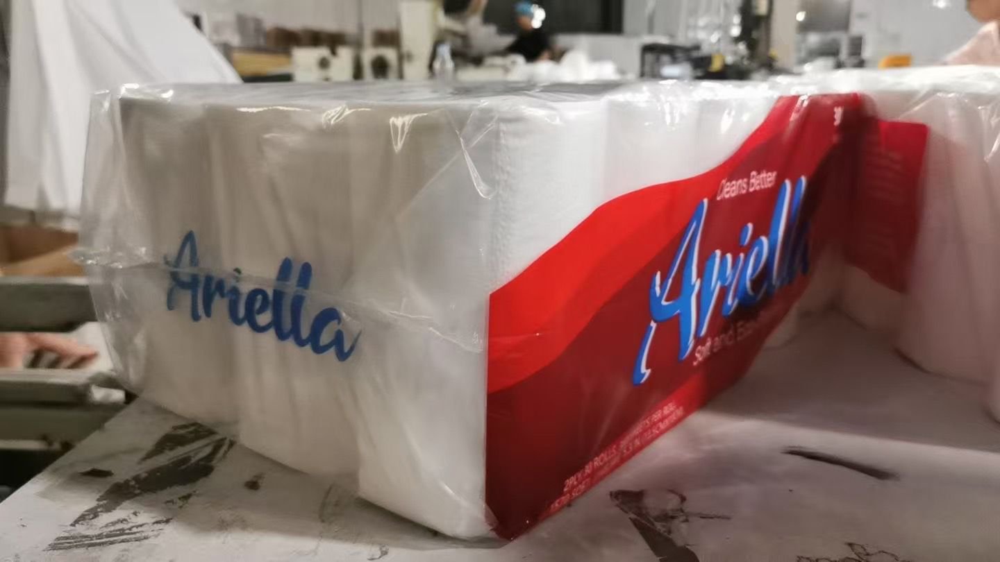 Real Ariella toilet tissue pack photographed at the factory