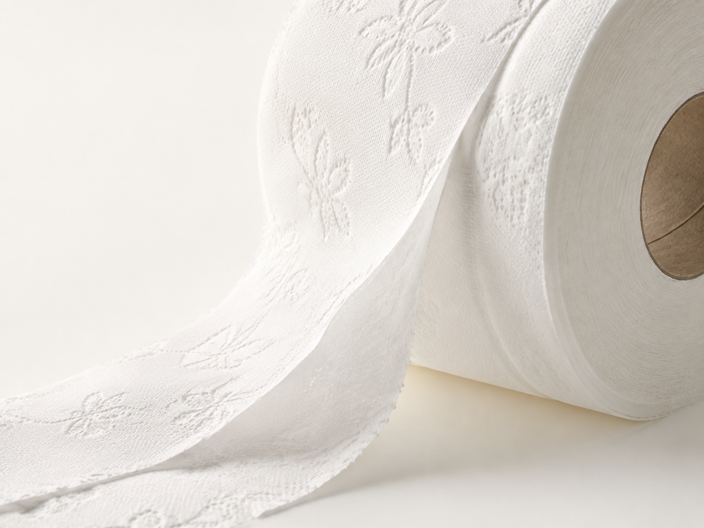 Close-up of soft white embossed toilet tissue
